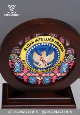 Plakat Kayu Bulat BIN Kabinda Papua Barat Daya