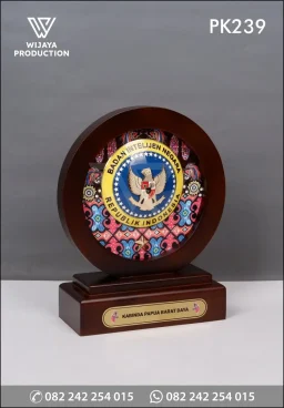 Plakat Kayu Bulat BIN Kabinda Papua Barat Daya